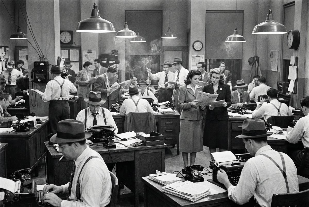 A busy mid-century newsroom.